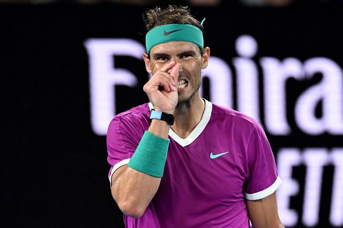 Rafael Nadal of Spain reacts during his third round Mens singles match against Karen Khachanov of Russia on Day 5 of the Australian Open, at Melbourne Park, in Melbourne, Friday, January 21, 2022. (AAP Image/Dave Hunt) NO ARCHIVING, EDITORIAL USE ONLY
