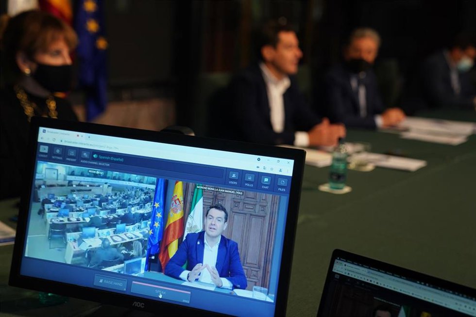 Archivo - Intervención telemática del presidente de la Junta de Andalucía, Juanma Moreno, en la décima reunión de la Comisión de Recursos Naturales del Comité Europeo de las Regiones (Foto de archivo).