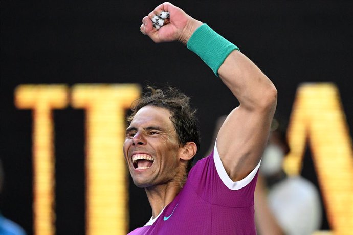 Rafael Nadal of Spain gestures to the crowd after winning his Mens singles quarterfinal match against Denis Shapovalov of Canada on Day 9 of the Australian Open, at Melbourne Park, in Melbourne, Tuesday, January 25, 2022. (AAP Image/Dean Lewins) NO ARC