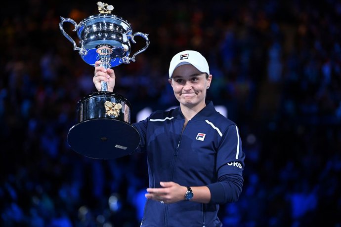 Ashleigh Barty of Australia holds the Daphne Akhurst Memorial Cup after winning the Womens singles final against Danielle Collins of the USA on Day 13 of the Australian Open, at Melbourne Park, in Melbourne, Saturday, January 29, 2022. (AAP Image/Dean 
