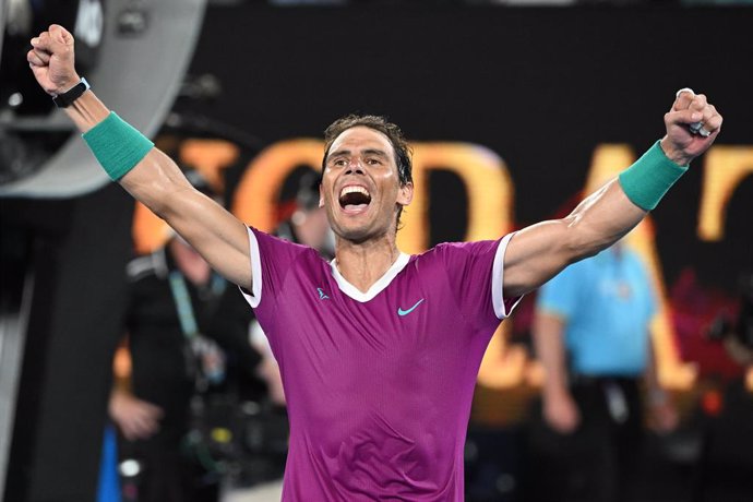 Rafael Nadal of Spain celebrates after defeating Daniil Medveded of Russia in the mens singles final on Day 14 of the Australian Open at Melbourne Park in Melbourne, Sunday, January 30, 2022. (AAP Image/Dave Hunt) NO ARCHIVING, EDITORIAL USE ONLY