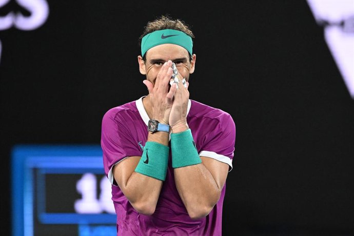 Rafael Nadal of Spain celebrates after defeating Daniil Medveded of Russia in the mens singles final on Day 14 of the Australian Open at Melbourne Park in Melbourne, Sunday, January 30, 2022. (AAP Image/Dave Hunt) NO ARCHIVING, EDITORIAL USE ONLY