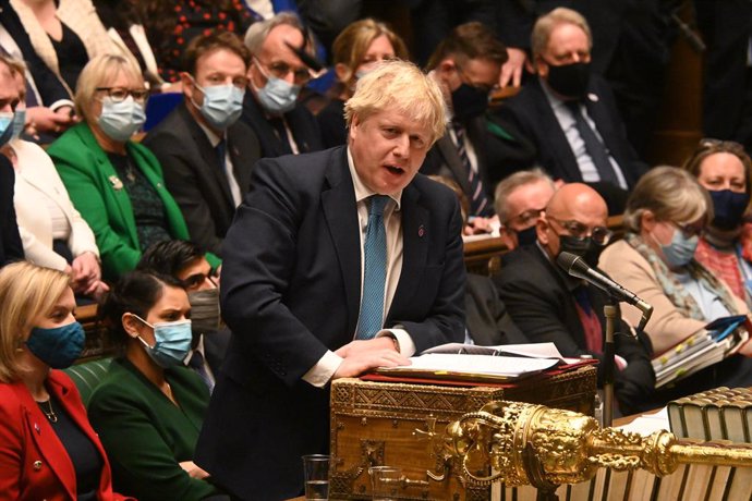 HANDOUT - 26 January 2022, United Kingdom, London: UK Prime Minister Boris Johnson speaks during the weekly Prime Minister's Questions session at the British Parliament. Photo: Jessica Taylor/House Of Commons via PA Wire/dpa - ACHTUNG: Nur zur redaktion