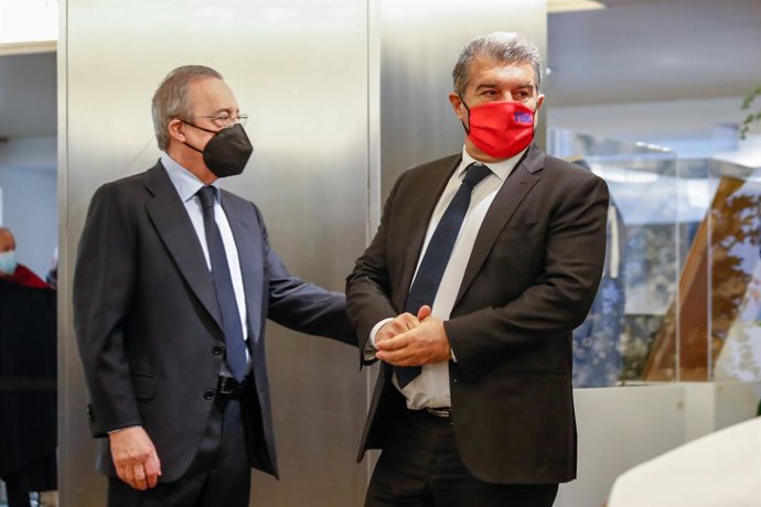 Joan Laporta and Florentino Perez are seen during the burning chapel of ex player of Real Madrid, Paco Gento, at the Palco de Honor of the Santiago Bernabeu Stadium on January 19, 2021, in Madrid, Spain.