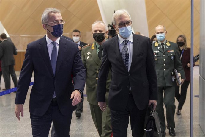 HANDOUT - 12 January 2022, Belgium, Brussels: (L-R) NATO Secretary General Jens Stoltenberg, Alexander Fomin, Russian Deputy Minister of Defence,and Alexander Grushko, Russian Deputy Minister of Foreign Affairs, arrive for the NATO-Russia Council meetin