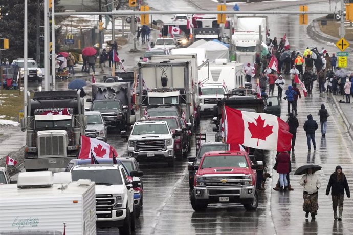 11 February 2022, Canada, Windsor: Truckers and supporters block the access leading from the Ambassador Bridge, linking Detroit and Windsor, as truckers and their supporters continue to protest against COVID-19 vaccine mandates and restrictions. Photo: 