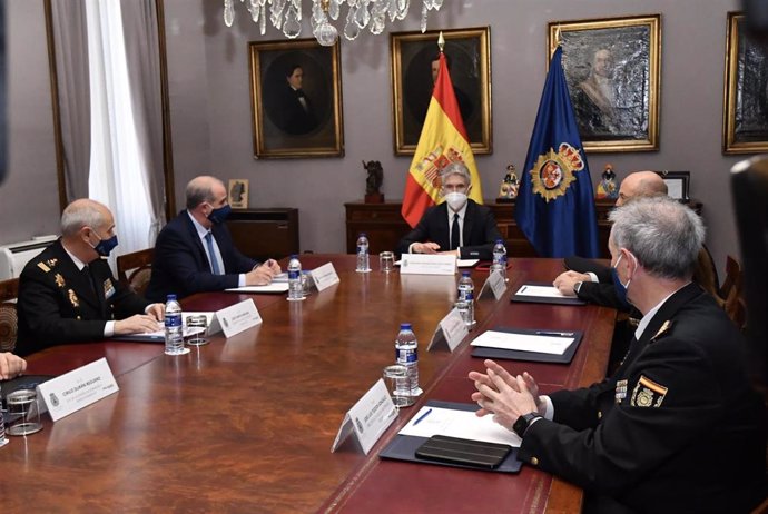 El ministro del Interior, Fernando Grande-Marlaska; el director general de la Policía, Francisco Pardo Piqueras, y los responsables de formación y selección.