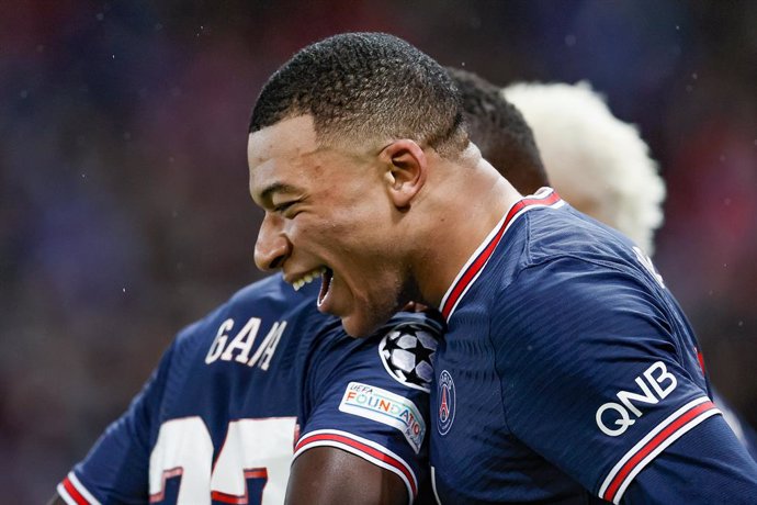 15 February 2022, France, Paris: Paris Saint-Germain's Kylian Mbappe celebrates scoring his side's first goal during the UEFA Champions League round of 16 first leg soccer match between Paris Saint-Germain and Real Madrid at Parc des Princes stadium. Ph