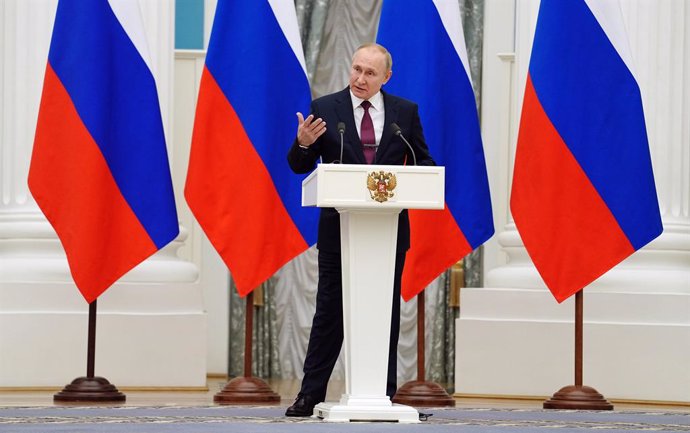 15 February 2022, Russia, Moscow: Russian President Vladimir Putin speaks at a joint press conference with German Chancellor Olaf Scholz, following their meeting in the Kremlin. Scholz met the Putin for talks on the situation on the Ukrainian-Russian bo