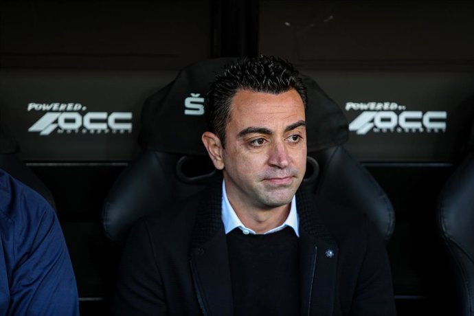 Xavi Hernandez, head coach of FC Barcelona, looks on during the Santander League match between Valencia CF and FC Barcelona at the Mestalla Stadium on February 20, 2022, in Valencia, Spain.