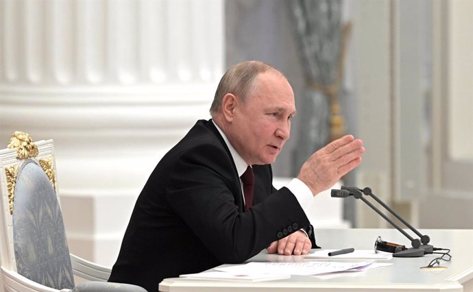 HANDOUT - 21 February 2022, Russia, Moscow: Russian President Vladimir Putin speaks during a meeting of the Russian Federation Security Council at the Kremlin. Photo: -/Kremlin/dpa - ATTENTION: editorial use only and only if the credit mentioned above i