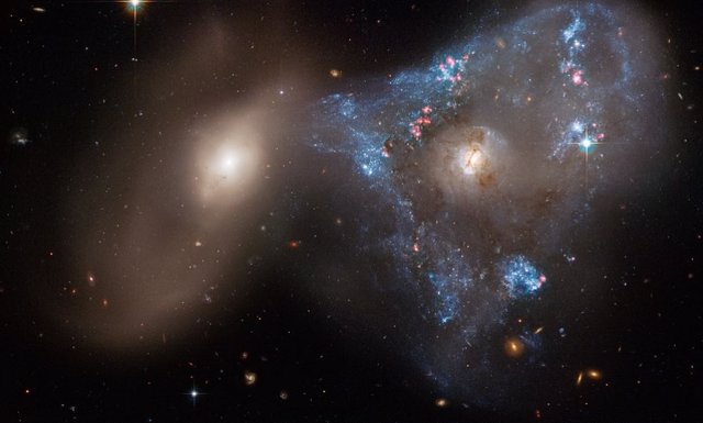 Colisión galáctica Arp 143