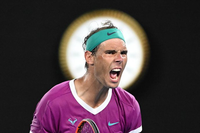 Rafael Nadal of Spain celebrates winning a game during the mens singles final against Daniil Medvedev of Russia on Day 14 of the Australian Open at Melbourne Park in Melbourne, Sunday, January 30, 2022. (AAP Image/Dave Hunt) NO ARCHIVING, EDITORIAL USE