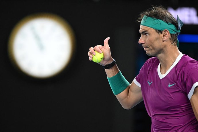 Rafael Nadal of Spain celebrates winning the third set during the mens singles final against Daniil Medvedev of Russia on Day 14 of the Australian Open at Melbourne Park in Melbourne, Sunday, January 30, 2022. (AAP Image/Dave Hunt) NO ARCHIVING, EDITOR