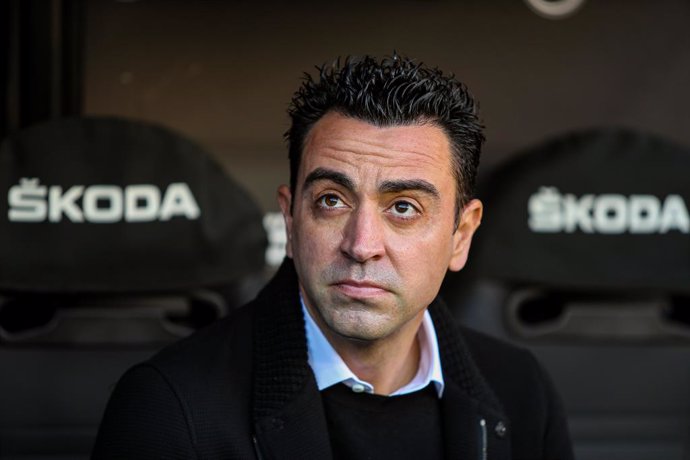 Xavi Hernandez, head coach of FC Barcelona, looks on during the Santander League match between Valencia CF and FC Barcelona at the Mestalla Stadium on February 20, 2022, in Valencia, Spain.