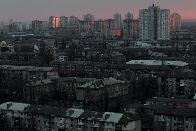 25 February 2022, Ukraine, Kiev: A general view of a residential area at dawn on the second day of the Russian invasion of Ukraine. Photo: -/Ukrinform/dpa