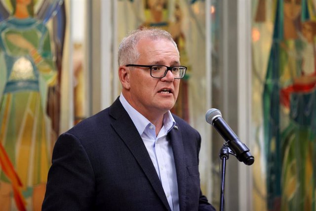 Prime Minister Scott Morrison speaks during a vigil at St Andrews Ukrainian Church in Sydney, Sunday, February 27, 2022. (AAP Image/Brendon Thorne) NO ARCHIVING