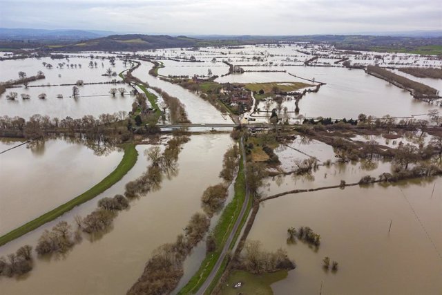 28 February 2022, United Kingdom, Apperley: The River Severn floods around Apperley in Gloucestershire. Photo: Ben Birchall/PA Wire/dpa