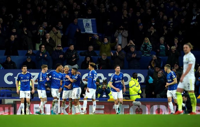 12 February 2022, United Kingdom, Liverpool: Everton's Richarlison (C) celebrates scoring his side's third goal with teammates during the English Premier League soccer match between Everton and Leeds United at Goodison Park. Photo: Peter Byrne/PA Wire/d
