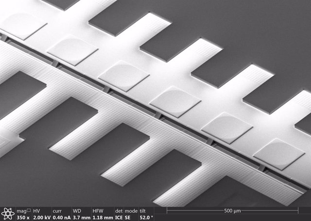 NanoImprint of wafer level optics on silicon photonic wafer to be used for PhotonicPlug fiber assembly