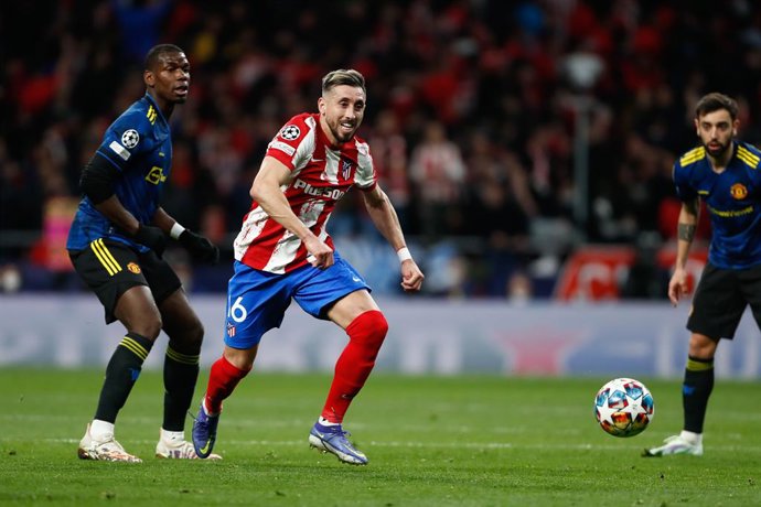 Hector Herrera of Atletico de Madrid and Paul Pogba of Manchester United in action during the UEFA Champions League, round of 16, football match played between Atletico de Madrid and Manchester United on February 23, 2022, in Madrid, Spain.