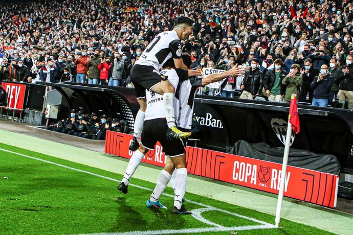Goncalo Guedes of Valencia CF celebrates a goal with teammates during the semifinal of the Spanish Copa del Rey, match between Valencia CF and Athletic Club de Bilbao at the Mestalla Stadium on March 2, 2022, in Valencia, Spain.