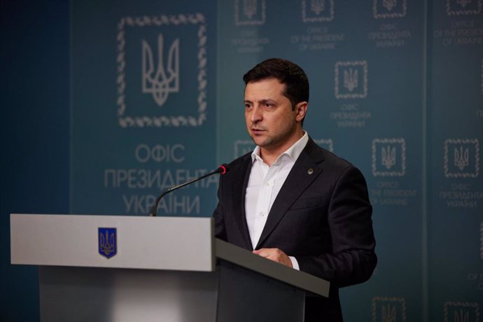 HANDOUT - 24 February 2022, Ukraine, Kiev: Ukrainian President Volodymyr Zelensky speaks during a press conference. Ukraine is severing diplomatic relations with Moscow in response to Russia's invasion. Photo: -/Ukrainian Presidency/dpa - ATTENTION: edi