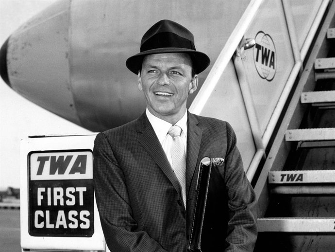FRANK SINATRA at the New York International Airport after spending a few days as a guest of President Kennedy.