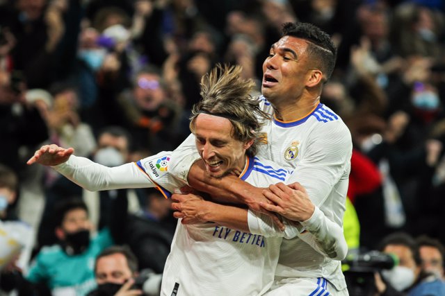 Luka Modric celebrates a goal with Carlos Henrique Casemiro of Real Madrid during the spanish league, La Liga Santander, football match played between Real Madrid and Real Sociedad at Santiago Bernabeu stadium on March 05, 2022, in Madrid, Spain.