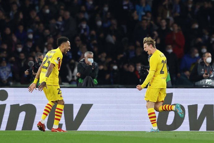 24 February 2022, Italy, Naples: Barcelona's Frankie de Jong (R) celebrates scoring his side's second goal with teammate Pierre Emerick Aubameyang during the UEFA Europa League soccer match between SSC Napoli and Barcelona at Diego Armando Maradona stad