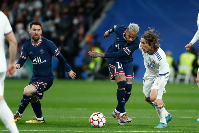 Luka Modric of Real Madrid and Neymar da Silva of PSG in action during the UEFA Champions League, round of 16 - second leg, football match played between Real Madrid and Paris Saint Germain - PSG at Santiago Bernabeu stadium on March 09, 2022, in Madrid