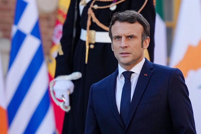 10 March 2022, France, Versailles: French President Emmanuel Macron waits at the Palace of Versailles before the start of the meeting of European Union EU leaders at an informal two-day meeting. The topic is the current development after the Russian att