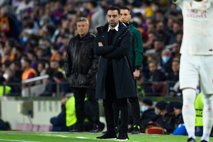 Barcelona manager Xavi Hernandez stands on the touchline during the UEFA Europa League round of 16 first leg soccer match between FC Barcelona and Galatasaray SK at Camp Nou.