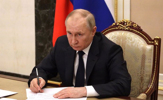 HANDOUT - 10 March 2022, Russia, Moscow: Russian President Vladimir Putin holds a meeting with members of the Government via videoconference. Photo: -/The Kremlin/dpa - ATTENTION: editorial use only and only if the credit mentioned above is referenced i