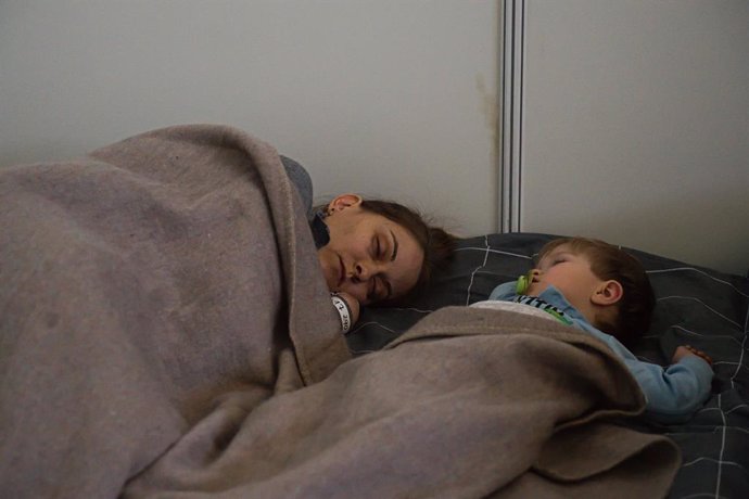 12 March 2022, Czech Republic, Brno: Refugees from Ukraine sleep in Hall B at the Brno Exhibition, as the Russian invasion of Ukraine in its third week. Photo: Uhlí Patrik/CTK/dpa