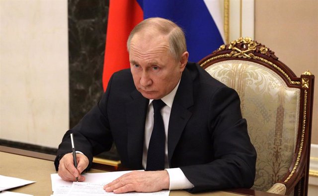 HANDOUT - 10 March 2022, Russia, Moscow: Russian President Vladimir Putin holds a meeting with members of the Government via videoconference. Photo: -/The Kremlin/dpa - ATTENTION: editorial use only and only if the credit mentioned above is referenced in 