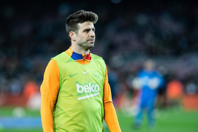 Gerard Pique of FC Barcelona looks on during the warming up of la Liga football match played between FC Barcelona and Osasuna at Camp Nou stadium on March 13, 2022, in Barcelona, Spain.