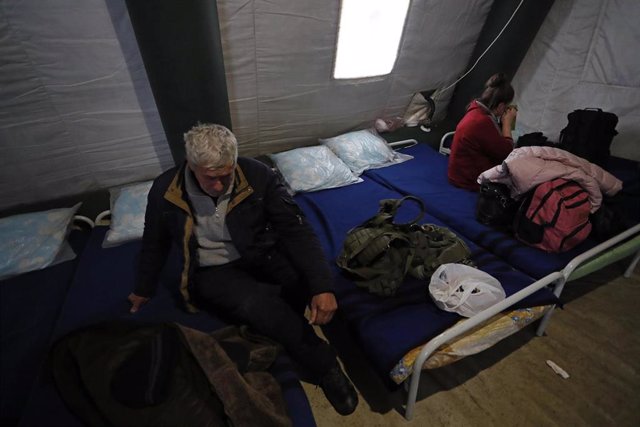 Displaced people from Mariupol in a settlement in Donetsk