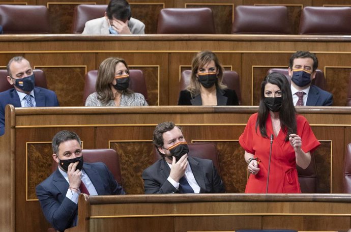 La portavoz de Vox en el Congreso de los Diputados, Macarena Olona, interviene en una sesión plenaria, en el Congreso de los Diputados, a 9 de marzo de 2022, en Madrid (España). El pleno, el primero celebrado sin el líder del PP, ha estado marcado por l