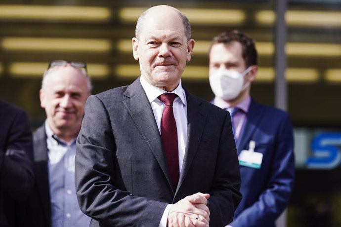18 March 2022, Rhineland-Palatinate, Kaiserslautern: German Chancellor Olaf Scholz stands at the German Research Center for Artificial Intelligence. Chancellor Olaf Scholz is visiting the German Research Center for Artificial Intelligence and the West P