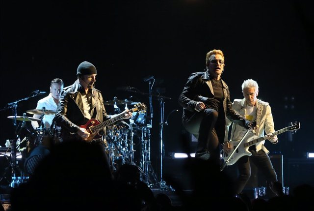 Archivo - (Left to right) Larry Mullen Jr, The Edge, Bono and Adam Clayton of U2 performing at the first of the band's sold-out homecoming gigs at the SSE Arena in Belfast.
