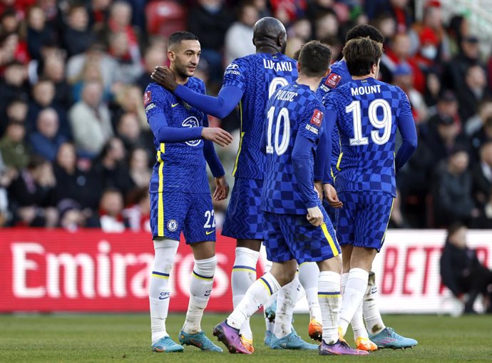 19 March 2022, United Kingdom, Middlesbrough: Chelsea's Hakim Ziyech (L) celebrates with his team-mates after scoring their side's second goal during the English FA Cup quarter final soccer match between Middlesbrough and Chelsea at the Riverside Stadiu