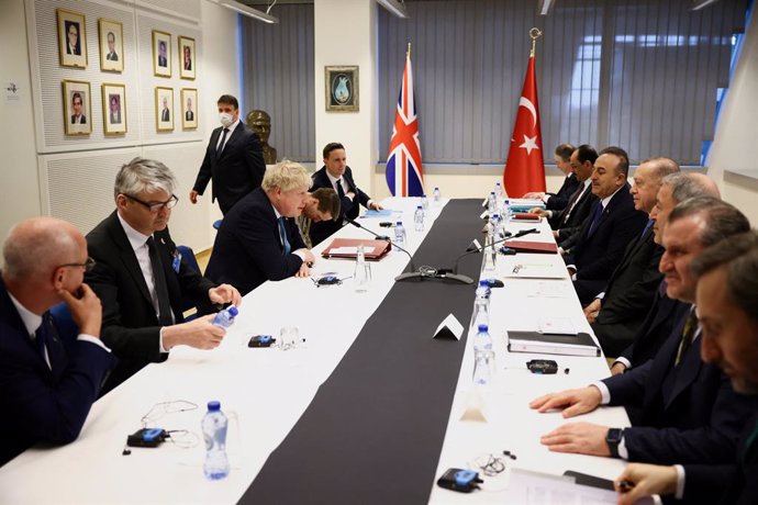 24 March 2022, Belgium, Brussels: UK Prime Minister Boris Johnson (3rd L) meets with Turkish President Recep Tayyip Erdogan (4th R) on teh sidelines of a special meeting of NATO Leaders to discuss Russia's invasion of Ukraine. Photo: Henry Nicholls/PA W