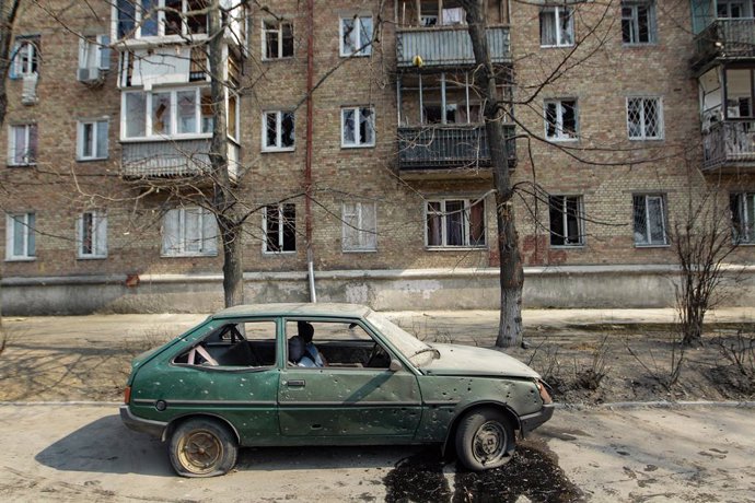 23 March 2022, Ukraine, Kiev: A car is seen destroyed in Kiev following a Russian shelling. Photo: -/Ukrinform/dpa
