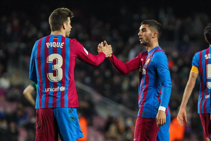 Ferran Torres celebrates a goal with Gerard Pique of FC Barcelona during the Spanish League, La Liga Santander, football match played between FC Barcelona and CA Osasuna at Camp Nou stadium on March 13, 2022, in Barcelona, Spain.