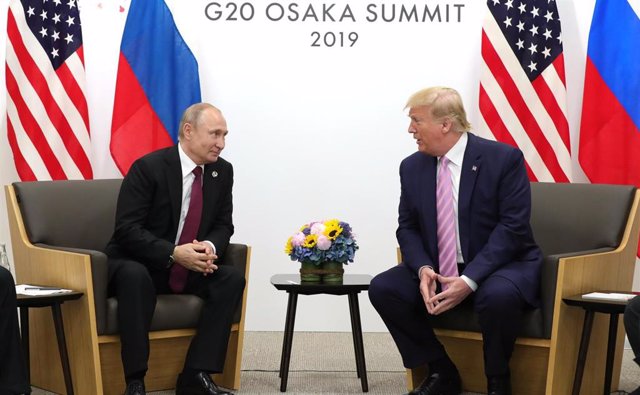 Archivo - Vladimir Putin y Donald Trump.
