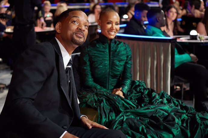 HANDOUT - 27 March 2022, US, Los Angeles: American actors Will Smith (L) and his wife Jada Pinkett Smith attends the 94th annual Academy Awards ceremony at the Dolby Theatre. Photo: -/Ampas via ZUMA Press Wire Service/dpa - ATTENTION: editorial use only