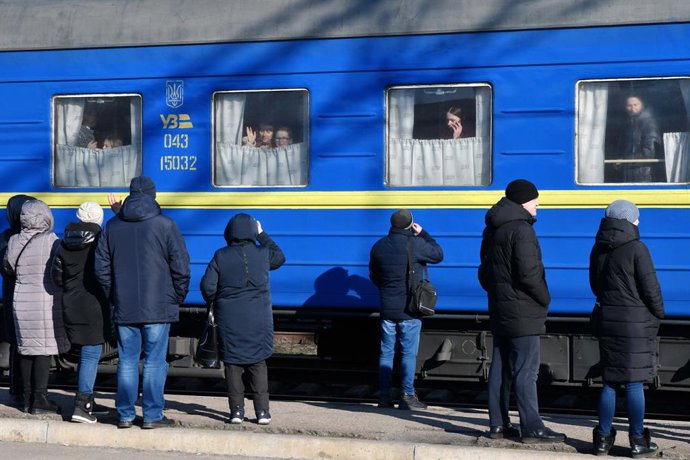 March 16, 2022, Kramatorsk, Donetsk, Ukraine: People stand on the platform as they say their farewell to family and relatives in a carriage windows during the evacuation on the extra train from the Kramatorsk railway station. More than three million ref
