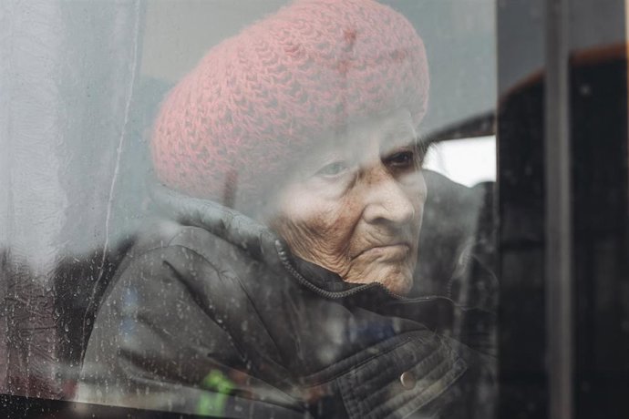 ZAPORIZHZHIA, March 31, 2022  -- A woman waits for evacuation in Zaporizhzhia region, Ukraine, on March 30, 2022.   Ukraine established three humanitarian corridors on Wednesday, Ukrainian Deputy Prime Minister Iryna Vereshchuk said on Telegram.   Two c