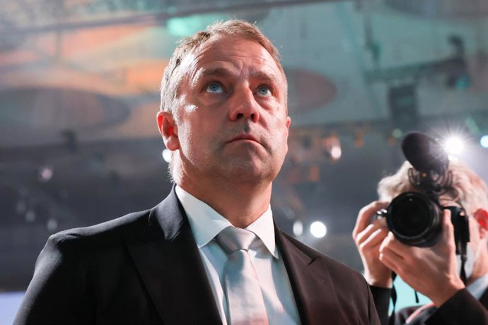 01 April 2022, Qatar, Doha: Germany's coach Hansi Flick  attends the FIFA World Cup Qatar 2022 Draw at the Doha Exhibition and Convention Center. Photo: Christian Charisius/dpa